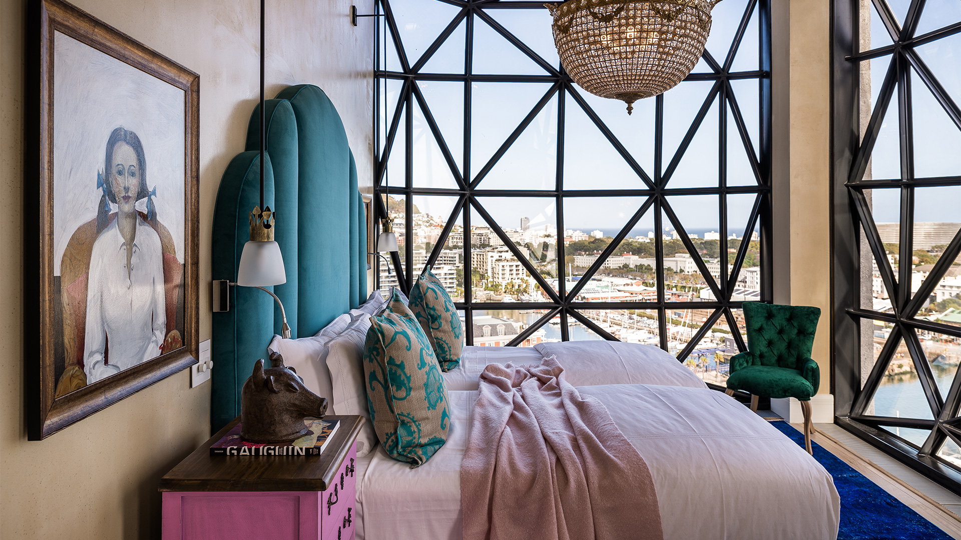 A bedroom with large windows at The Silo