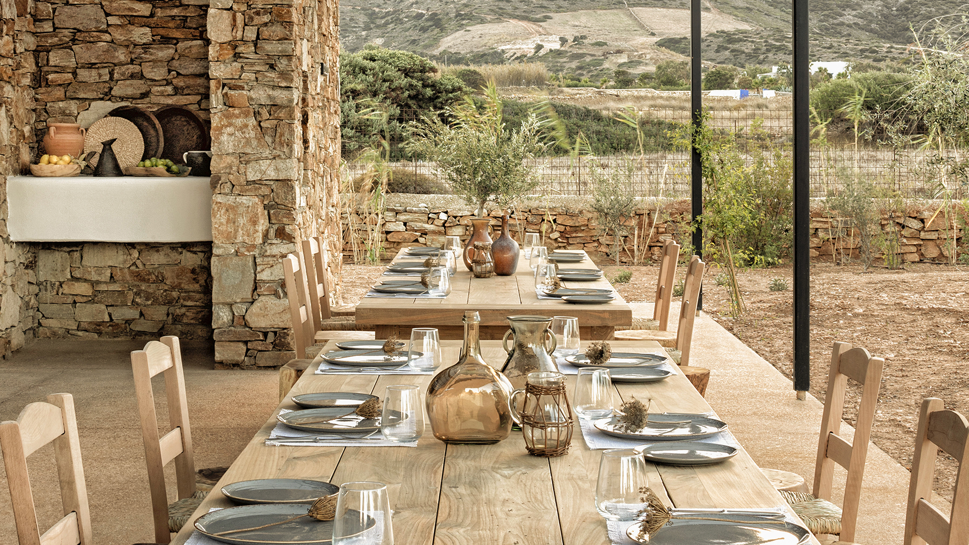 Europe, Greece, Paros, The Rooster, Farmhouse table set for dinner outdoors