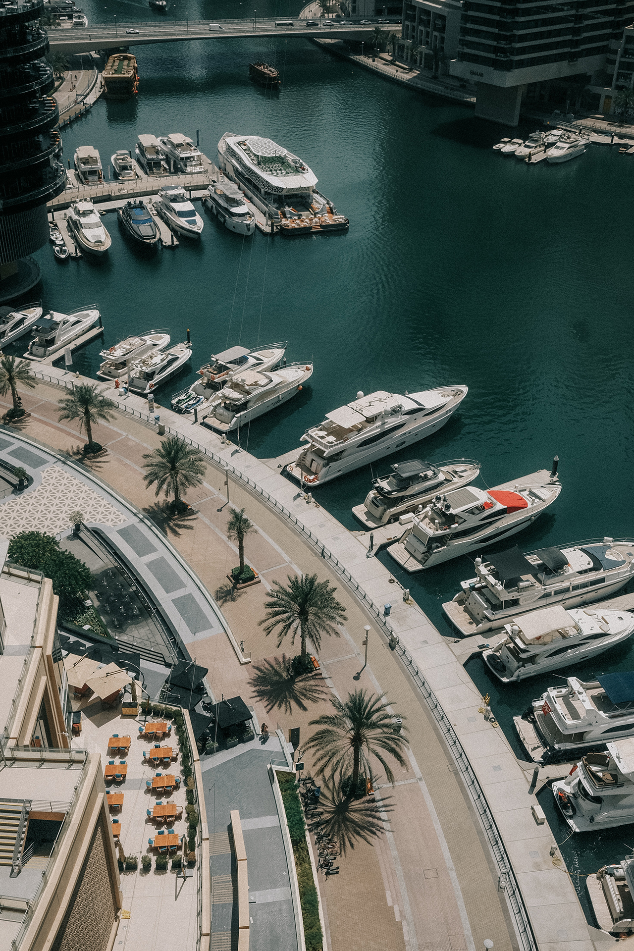 A boat dock with yachts docked