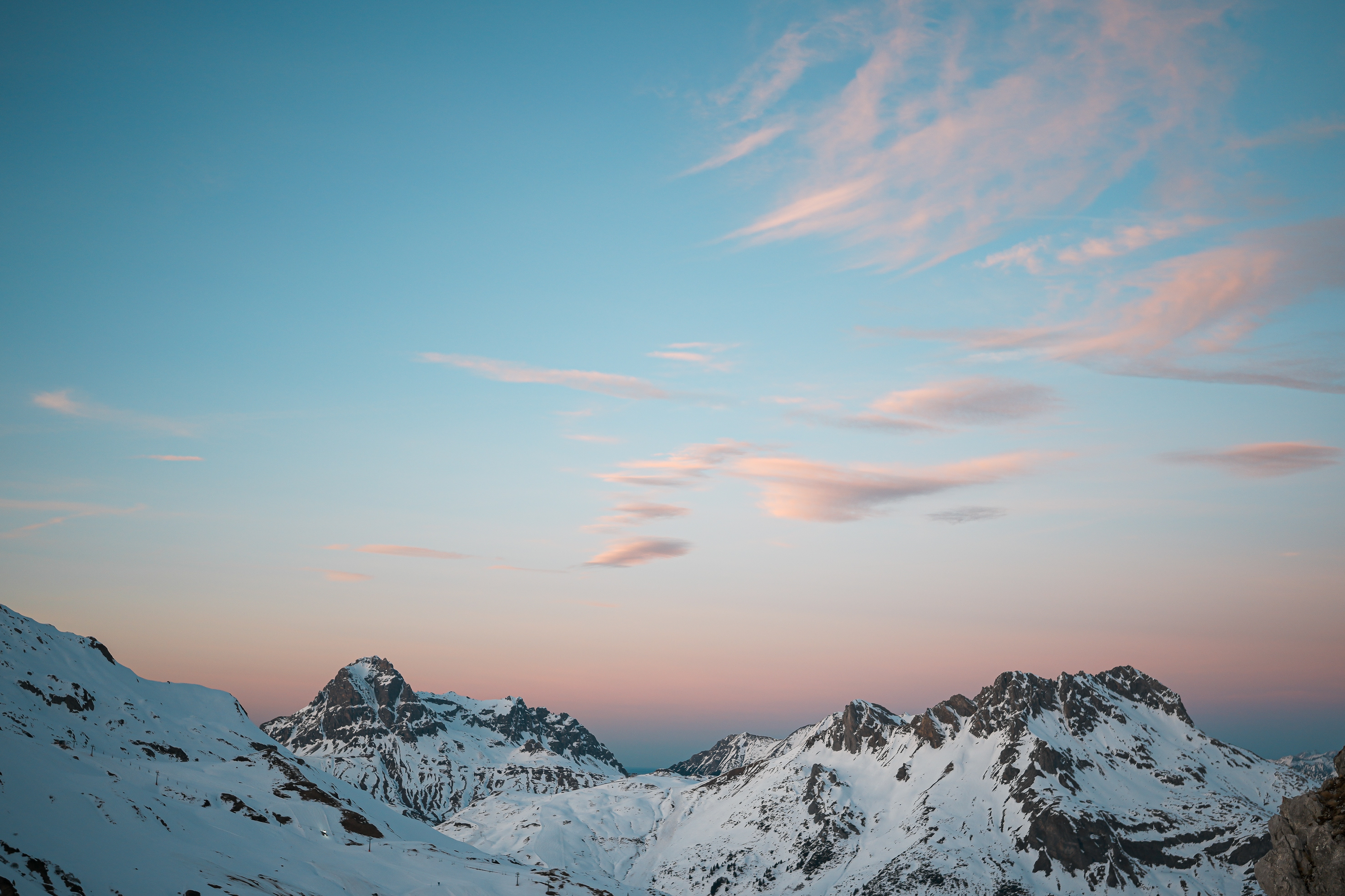 A view of a mountain range at sunset