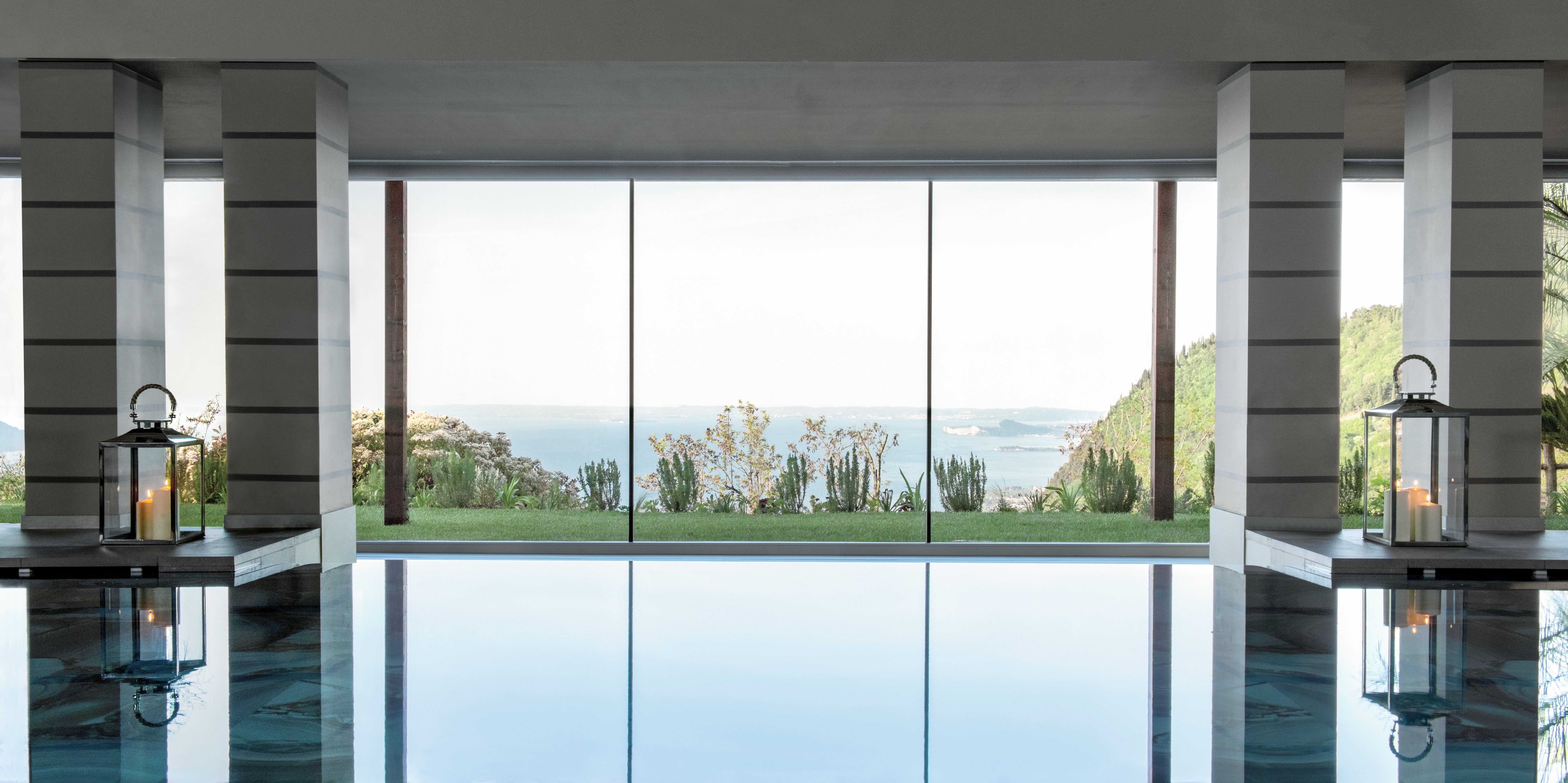 Europe, Italy, Lefay Resort & SPA Lago di Garda, adults area spa whirlpool with floor to ceiling windows and lake view