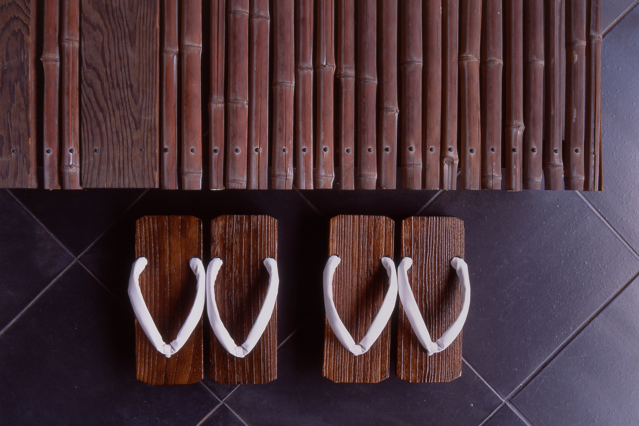 Two pairs of traditional Japanese wooden slippers