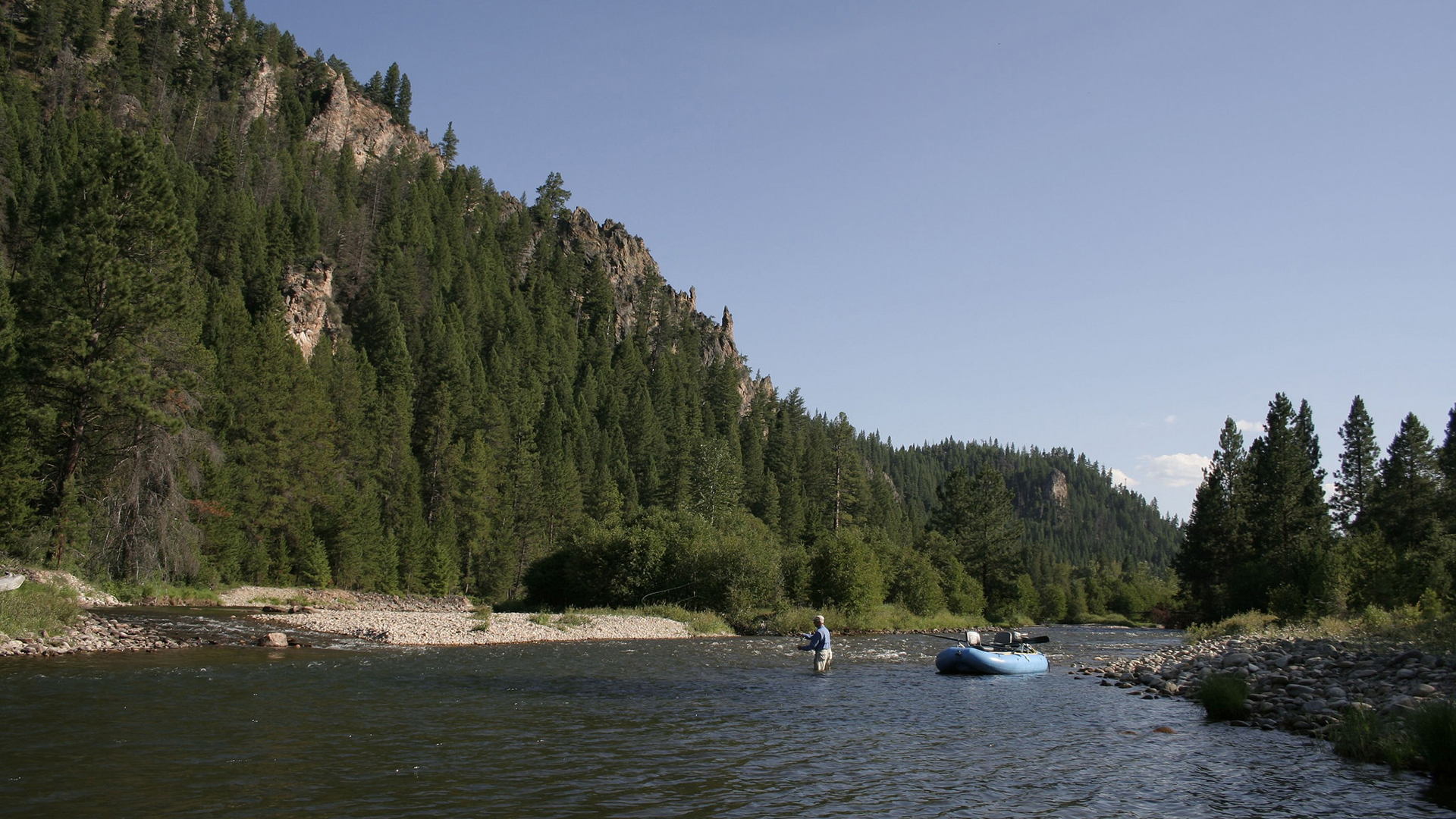  North America, Montana, Triple Creek Ranch, Flyfishing on a river