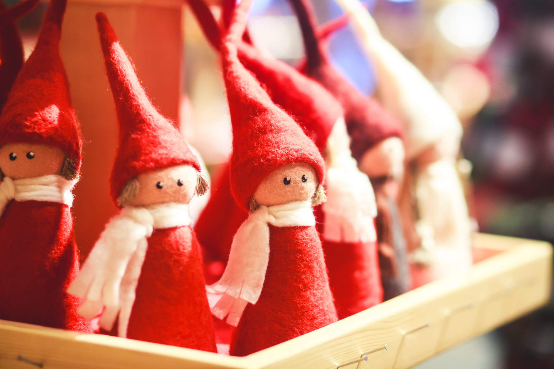 Chrismas decorations of small figures in red clothing and a white scarf