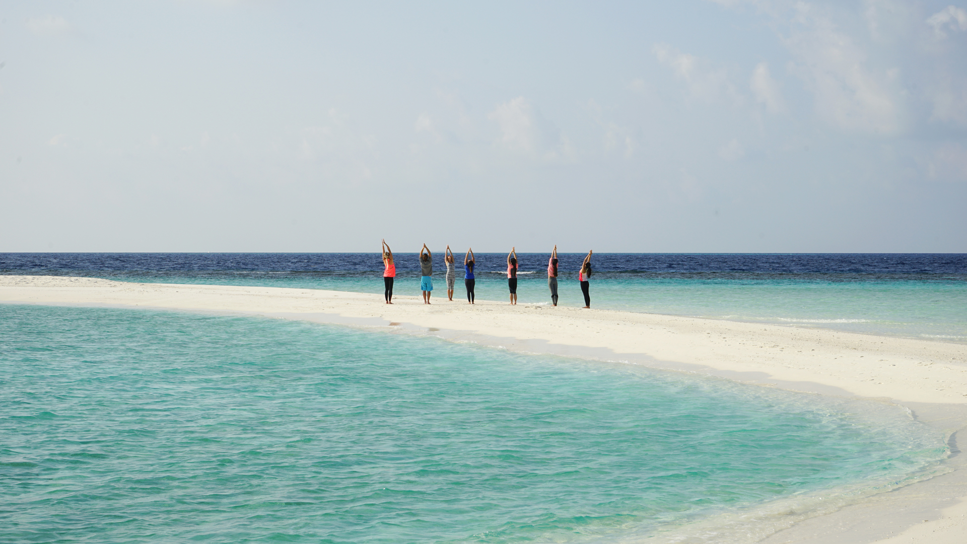 Private sandbank yoga at One&Only Reethi Rah Spa