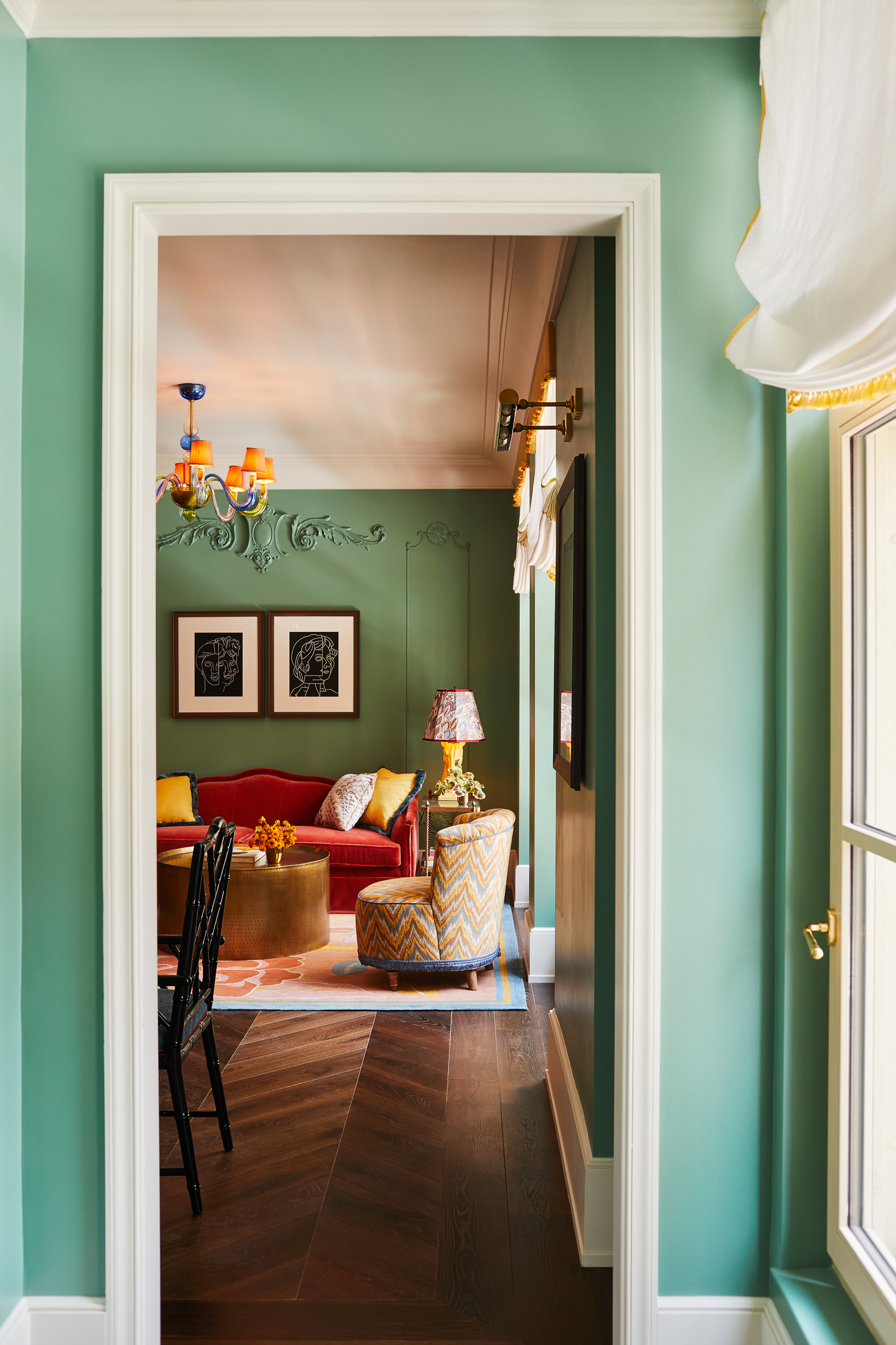 Green suite lounge through doorway