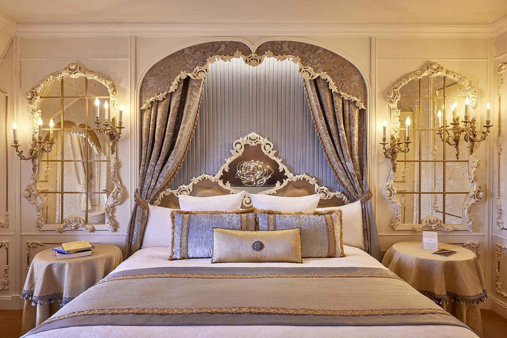 Europe, France, Paris, Disneyland® Hotel, bed and bedside tables in the Princely Suite