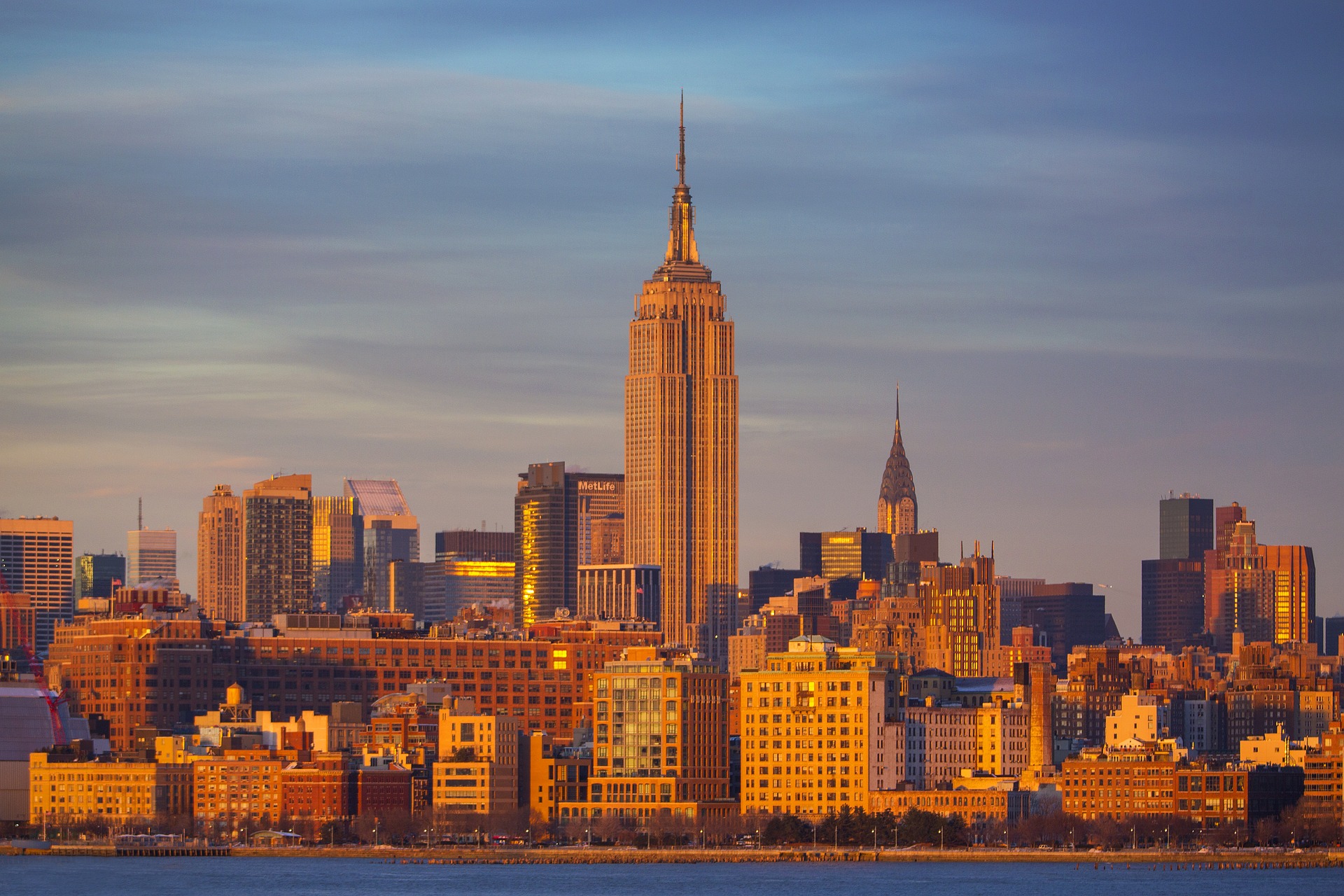 A sunset view of the Manhattan skyline taken from the River Hudson, the Empire State building is in the centre