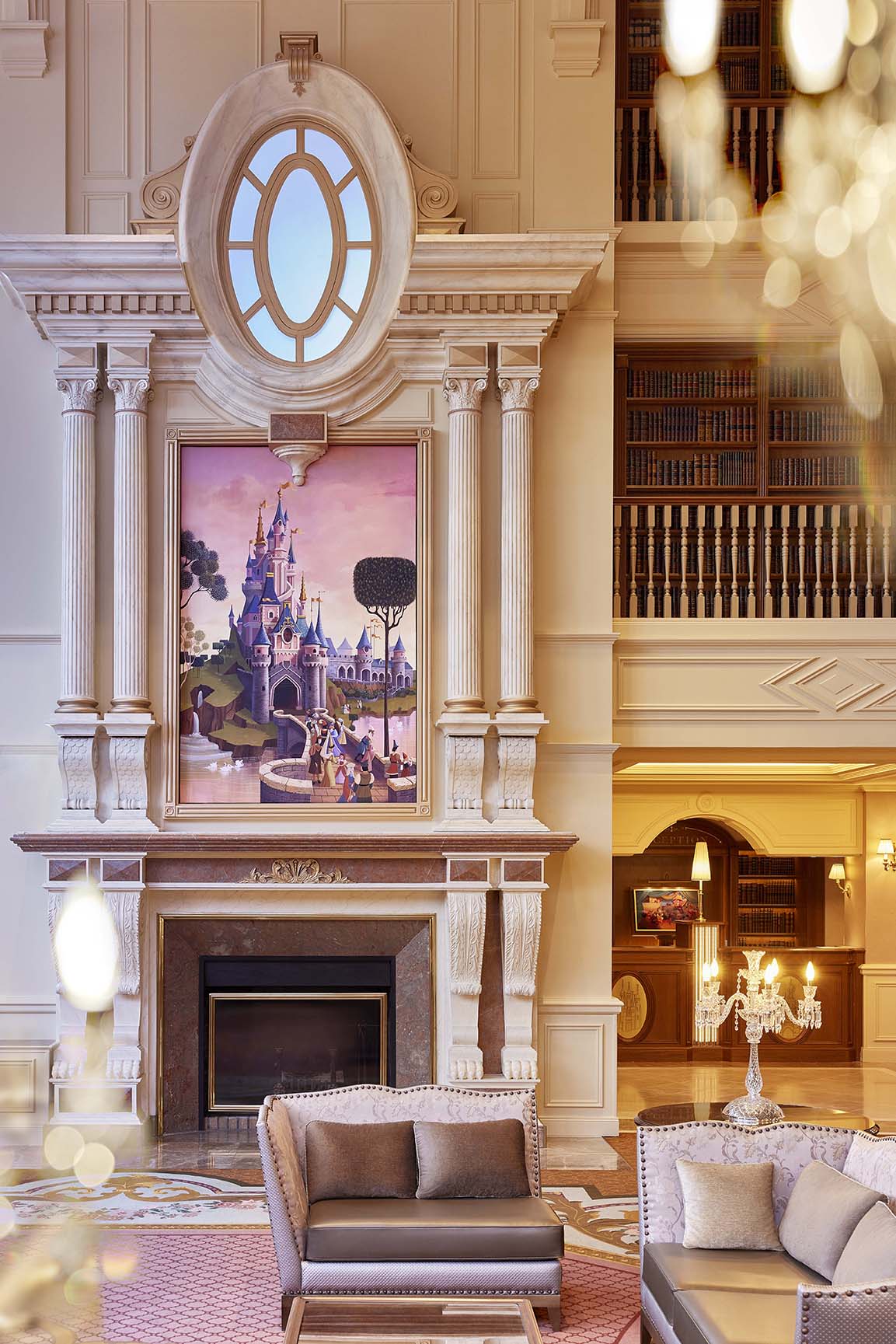 Europe, France, Paris, Disneyland® Hotel, a seating area in the lobby by the fireplace
