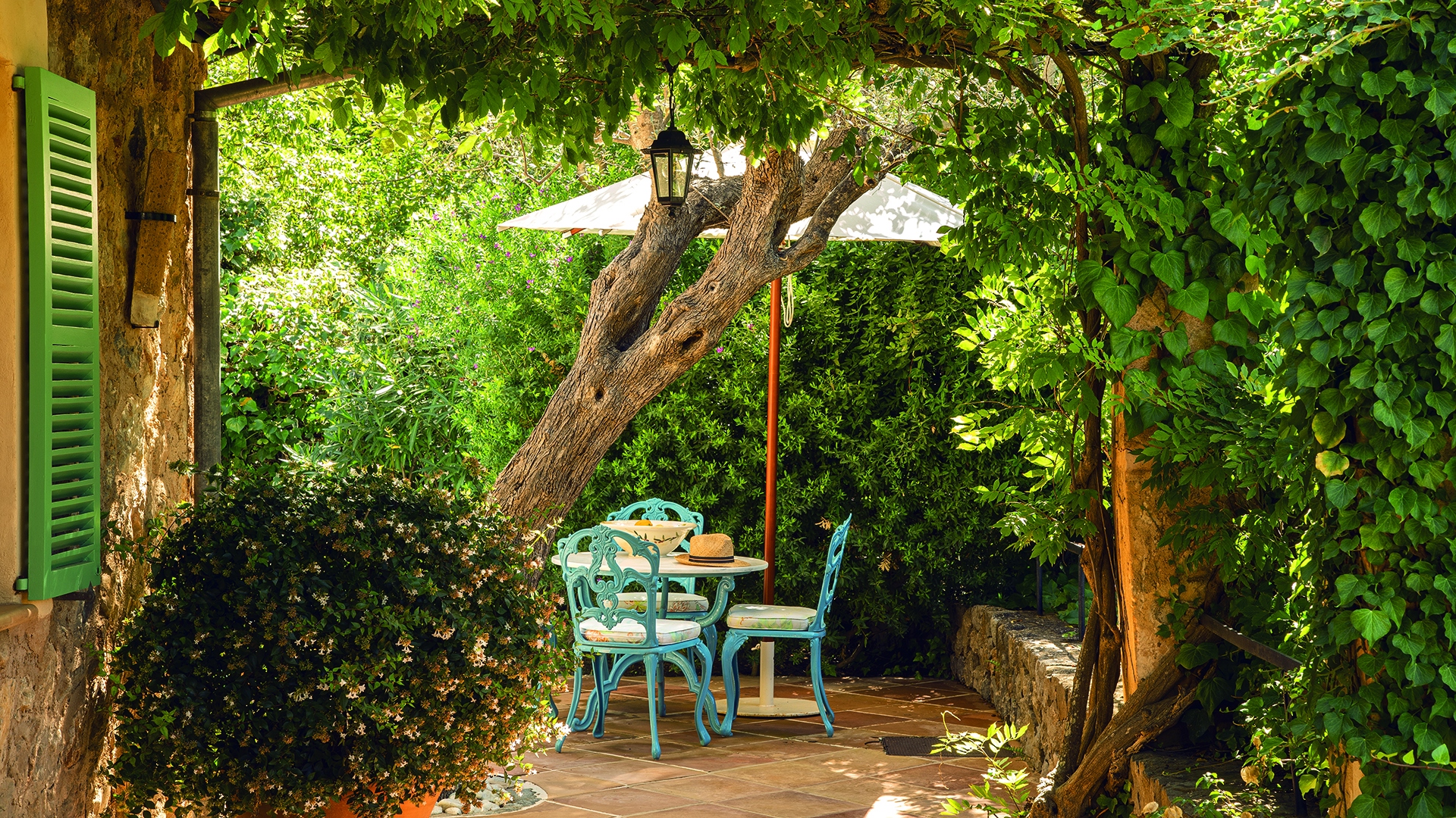 Europe, Spain, Mallorca, La Residencia A Belmond Hotel Mallorca, Bistro Set Under Trees