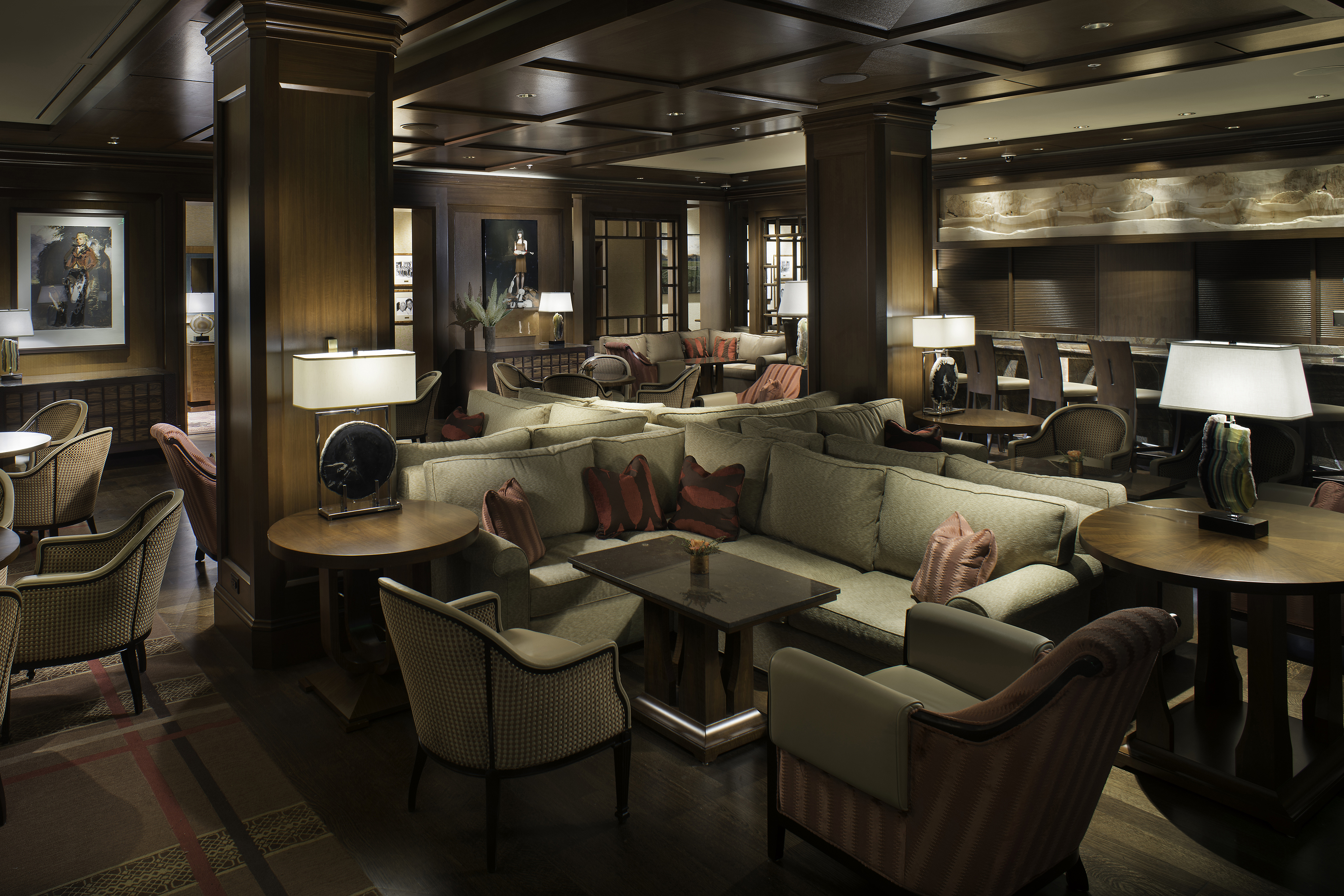 Luxurious lounge of Dunchin Room at Sun Valley Lodge featuring comfortable seating, warm wooden decor, and ambient lighting