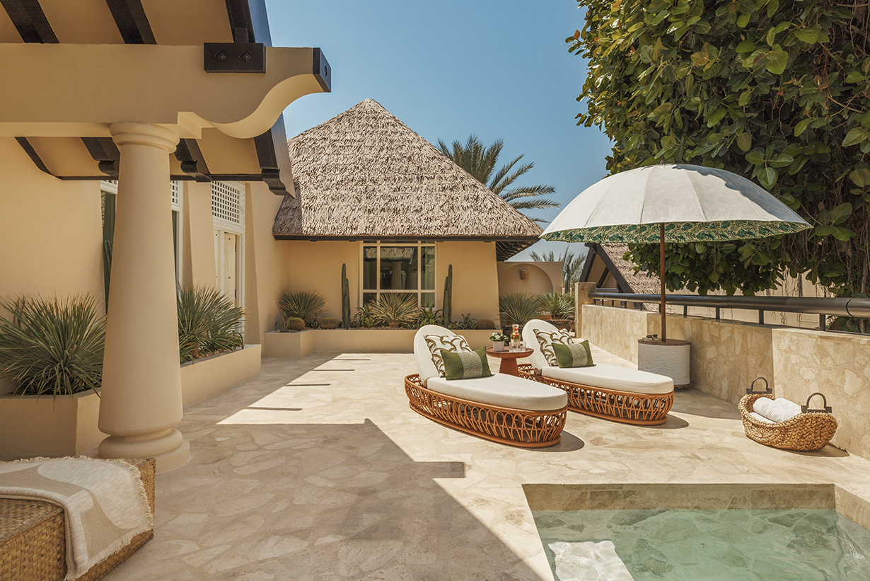 Arabia, UAE, Dubai, Jumeirah Beach Hotel, Two Bedroom Al Bahar Villa Terrace exterior, two sun loungers by the pool