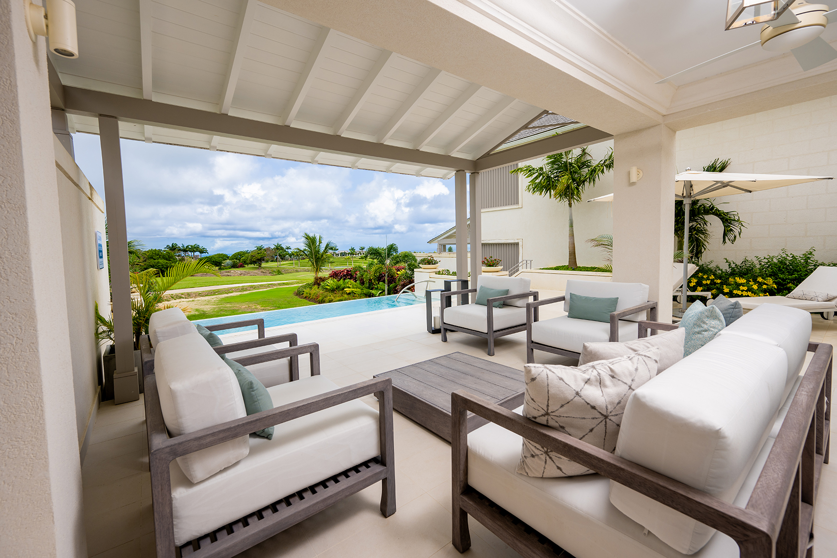 Caribbean & Mexico, Barbados, Apes Hill Barbados, seating on villa patio with private pool