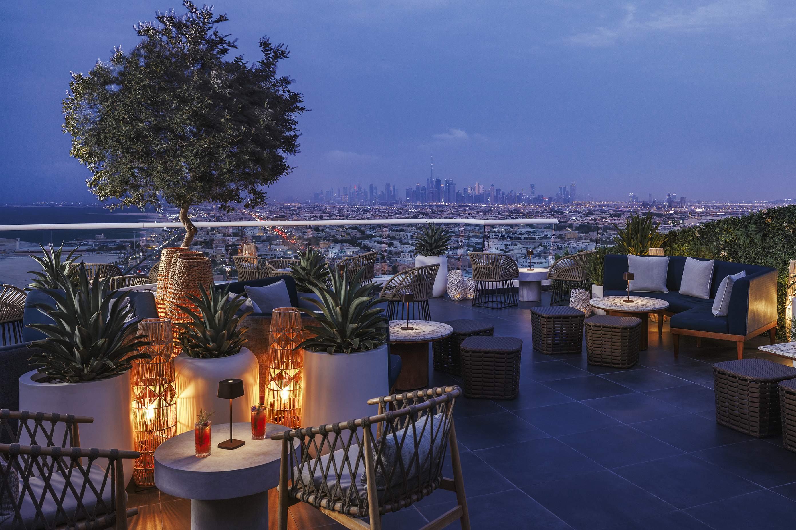 Terrace of Floor 24 at night with Dubai skyline