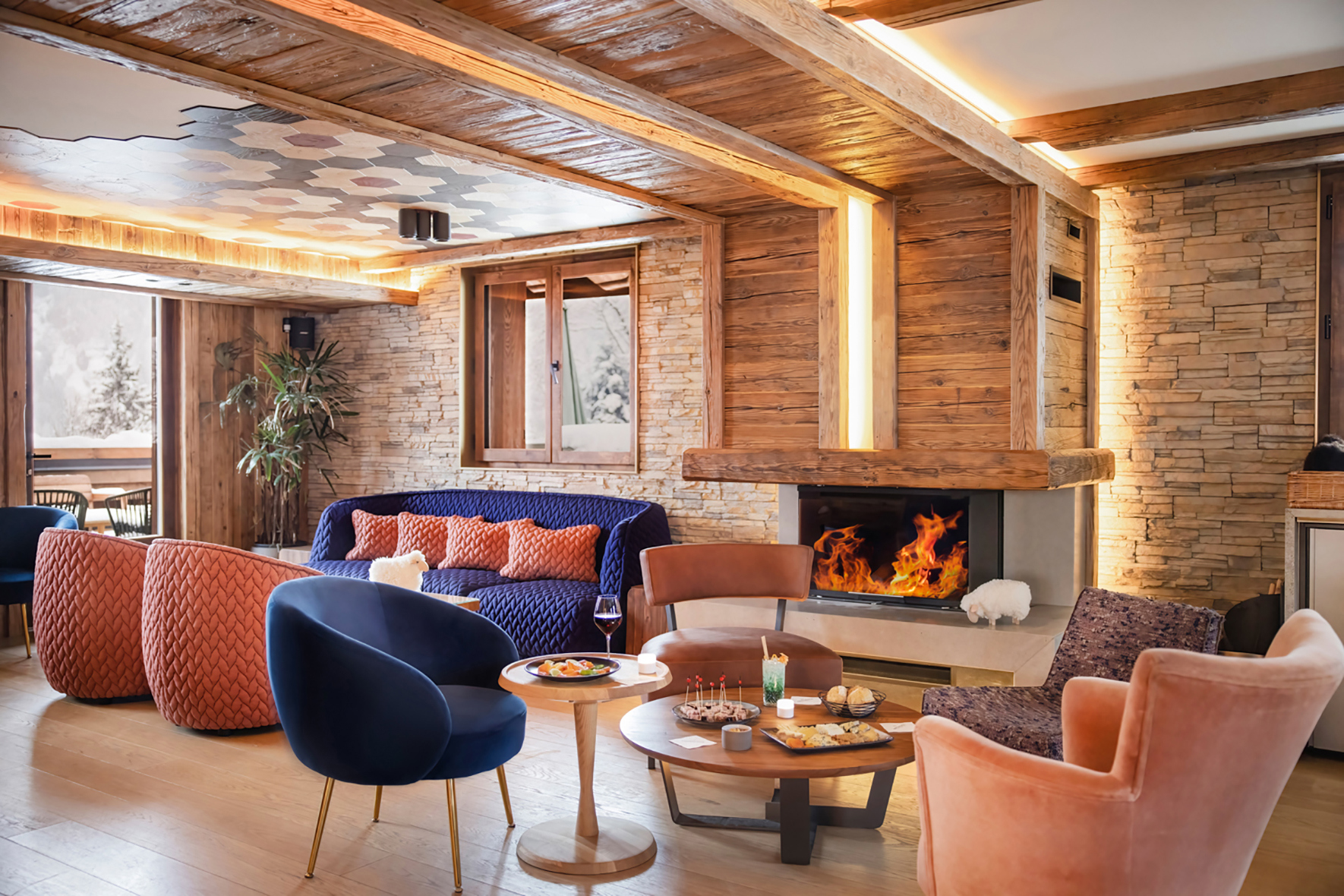 Ski & Snow, France, Megeve, Armancette, Mont Joly seats around a fireplace 