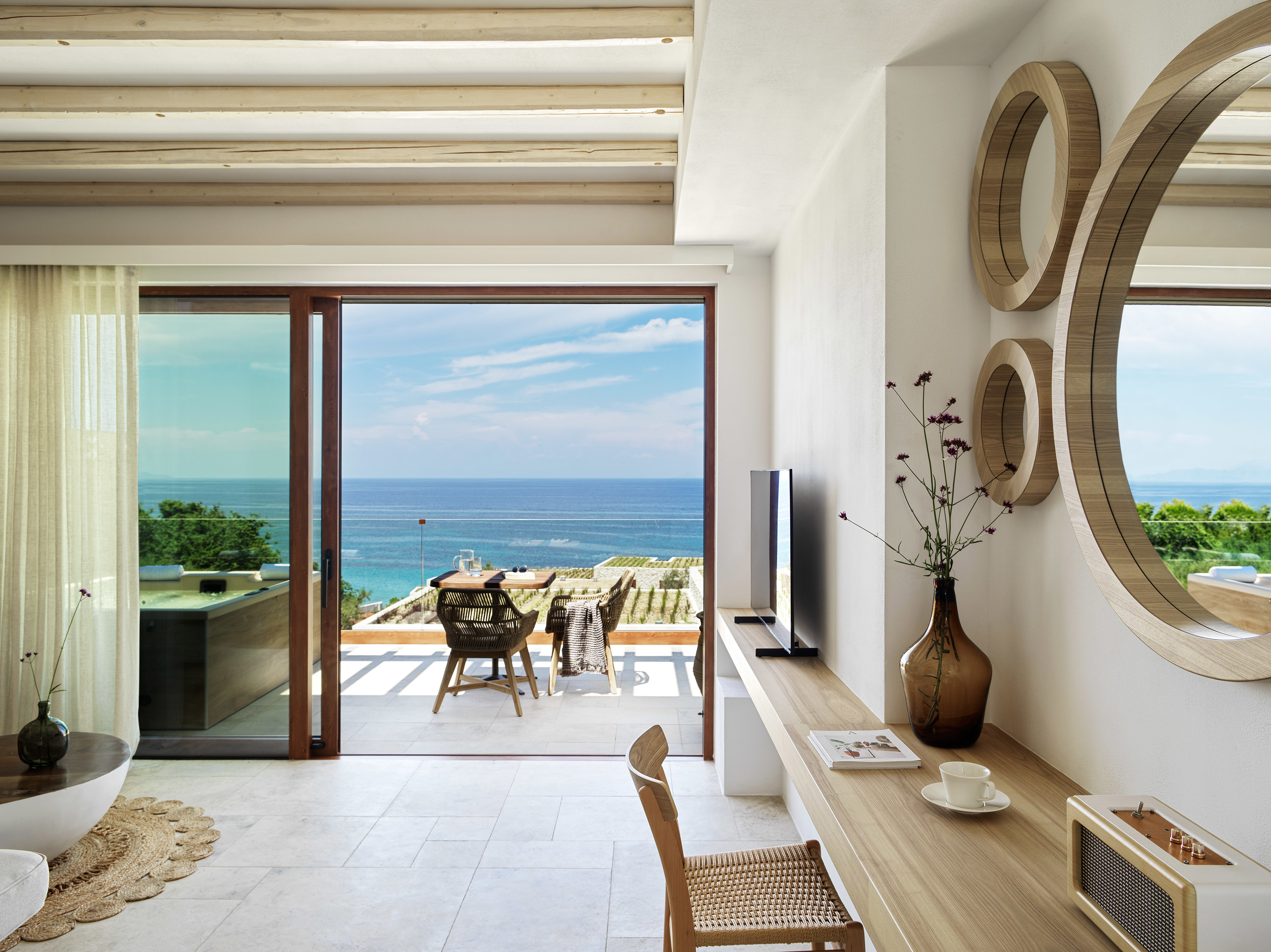 Desk area and terrace of Spa Sea View Suite  at Lesante Cape