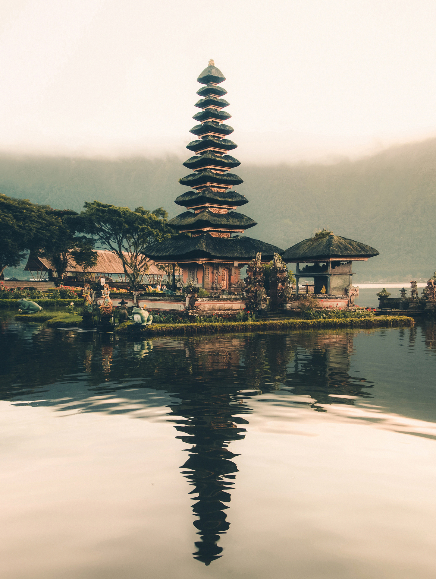 A temple building by the edge of a lake