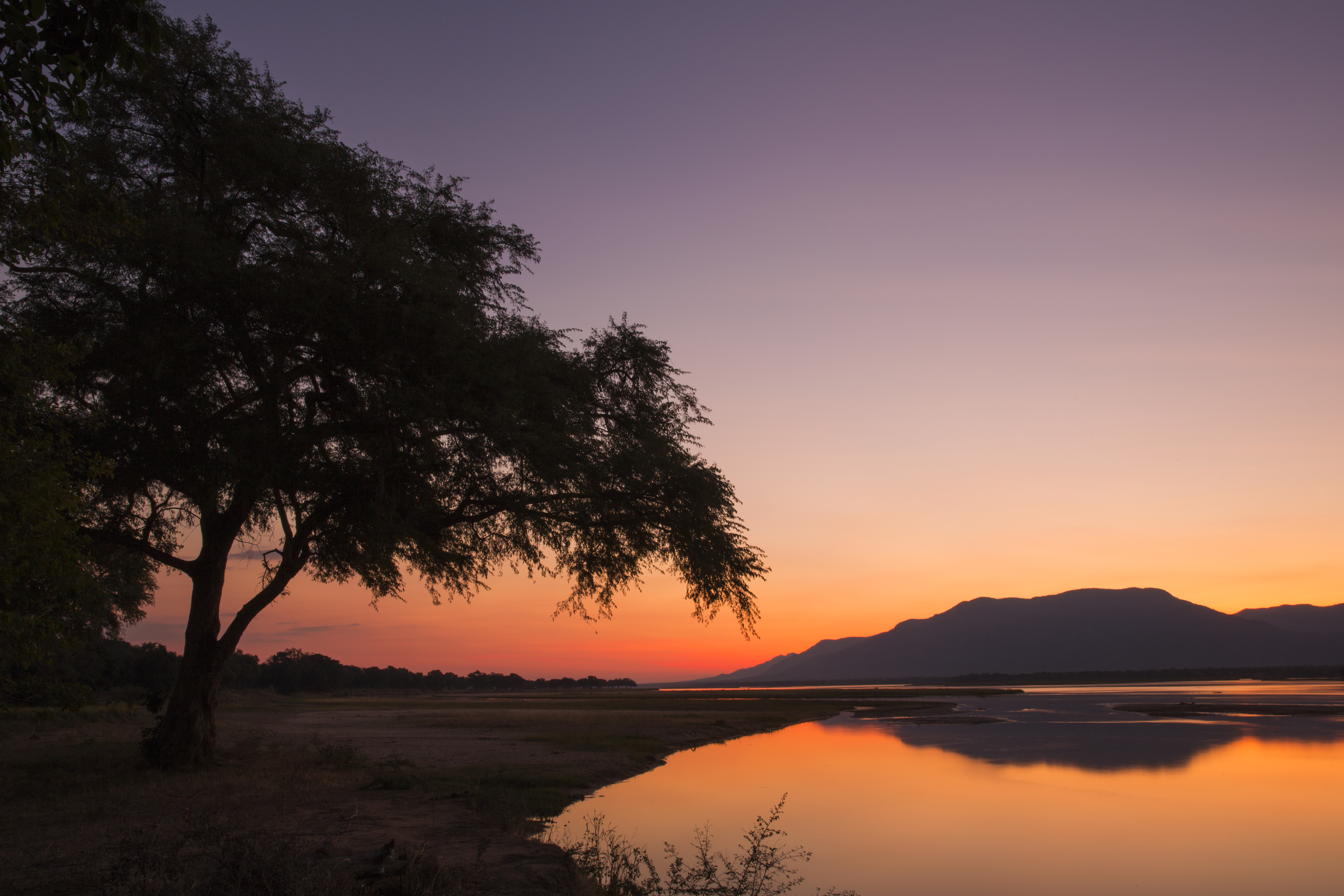 Africa, Zambia, sunset over the Zambezi River