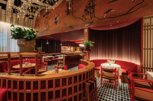 Ornately decorated dining room with red and wooden accents at Atlantis The Palm