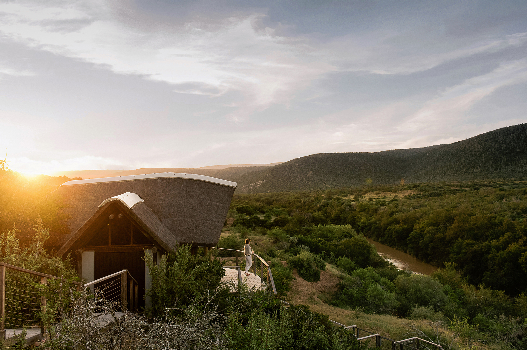 Africa, South Africa, Kwandwe Private Game Reserve, Great Fish River Lodge, person looking out from lodge terrace