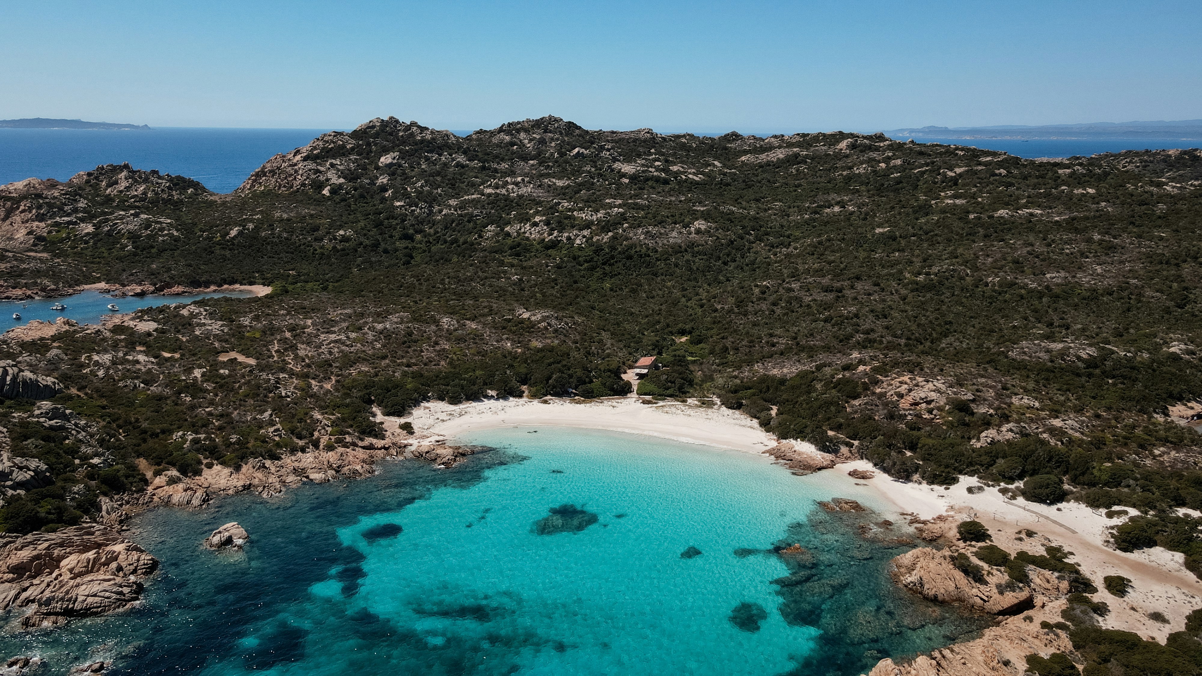Arocky coastline in Sardinia with clear blue water