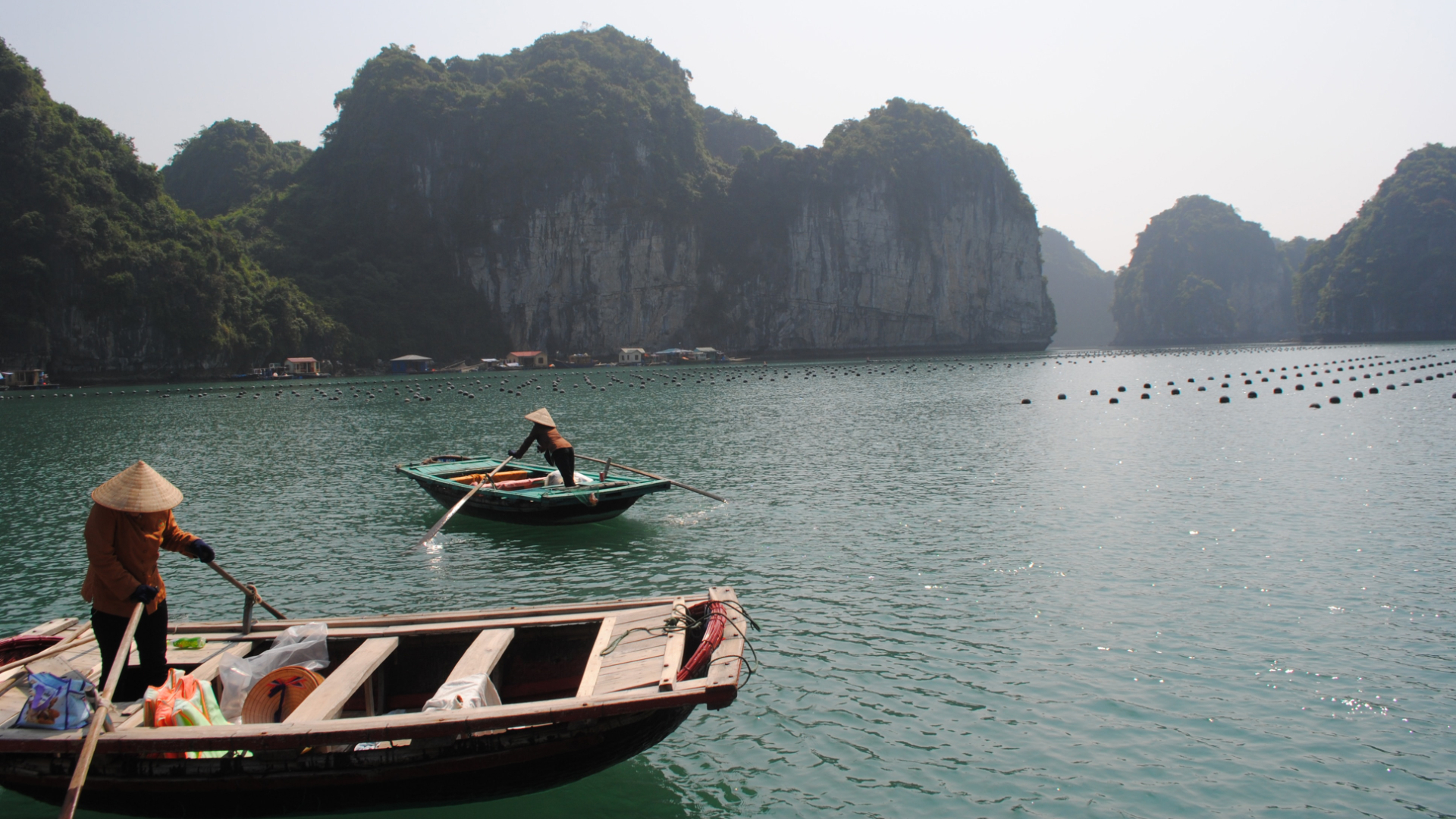 Two rowing boats in Ha Long Bay in Vietnam