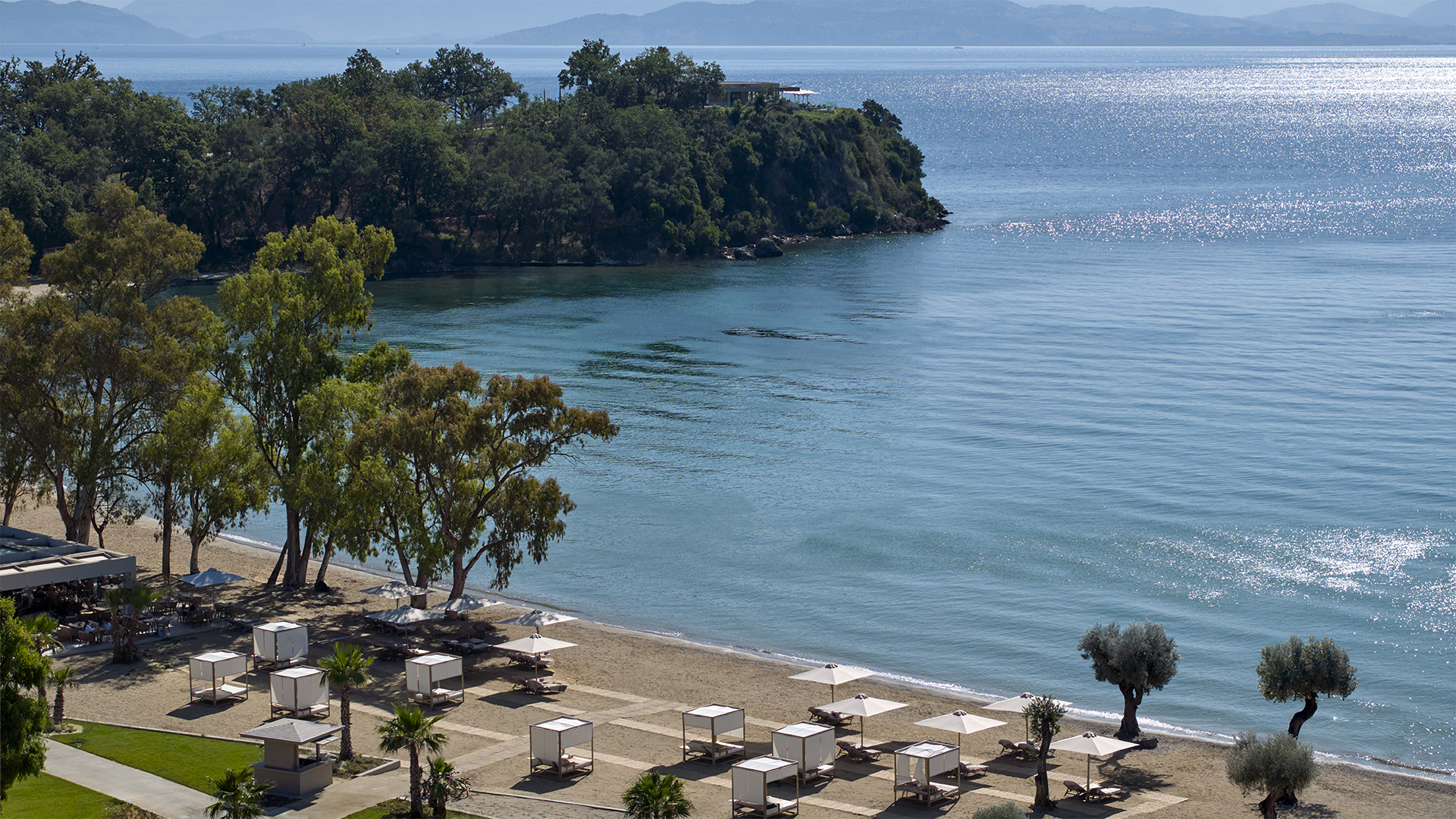 Beach with sun loungers 
