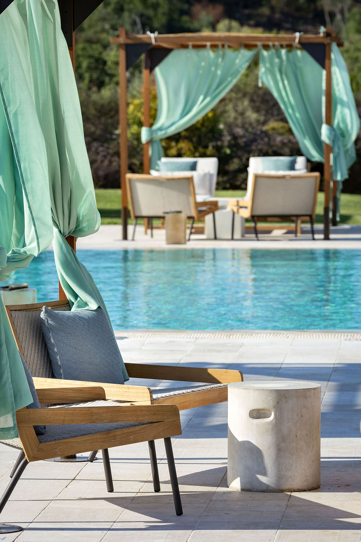 Europe, Italy, Sardinia, Baglioni Resort, close up view of two chairs beside the pool