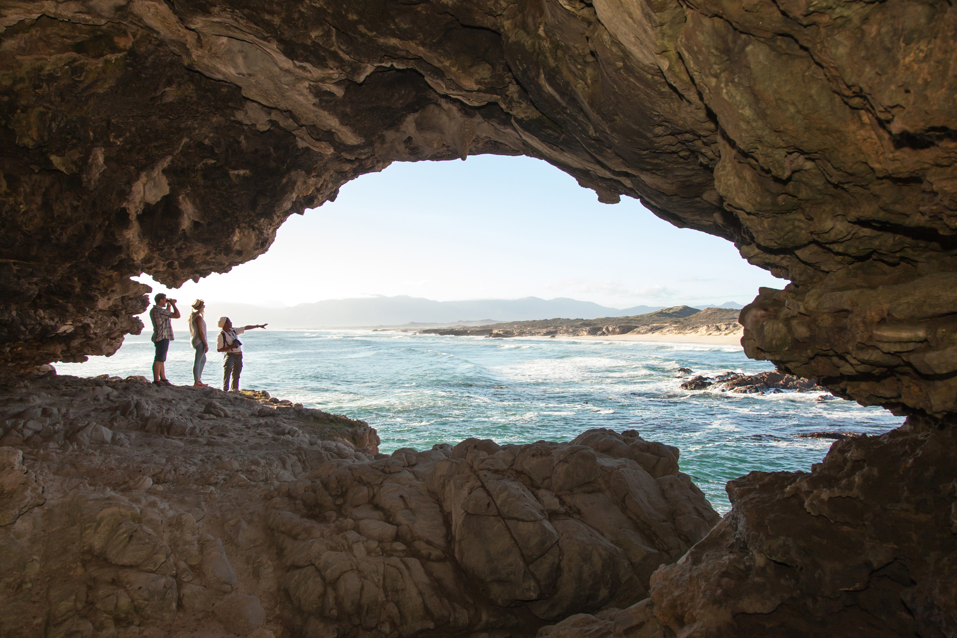 Group exploring coastal caves at Grootbos South Africa
