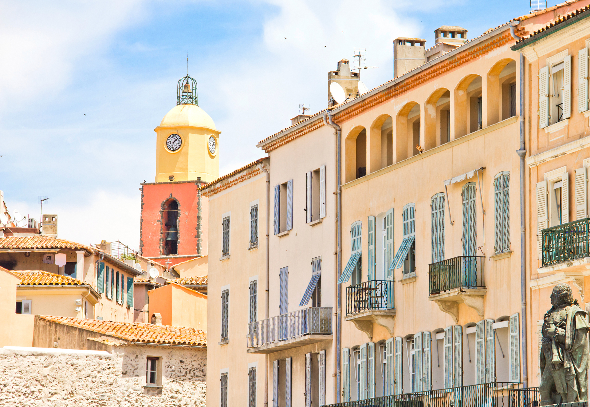 Yellow buildings and steeple in St Tropez