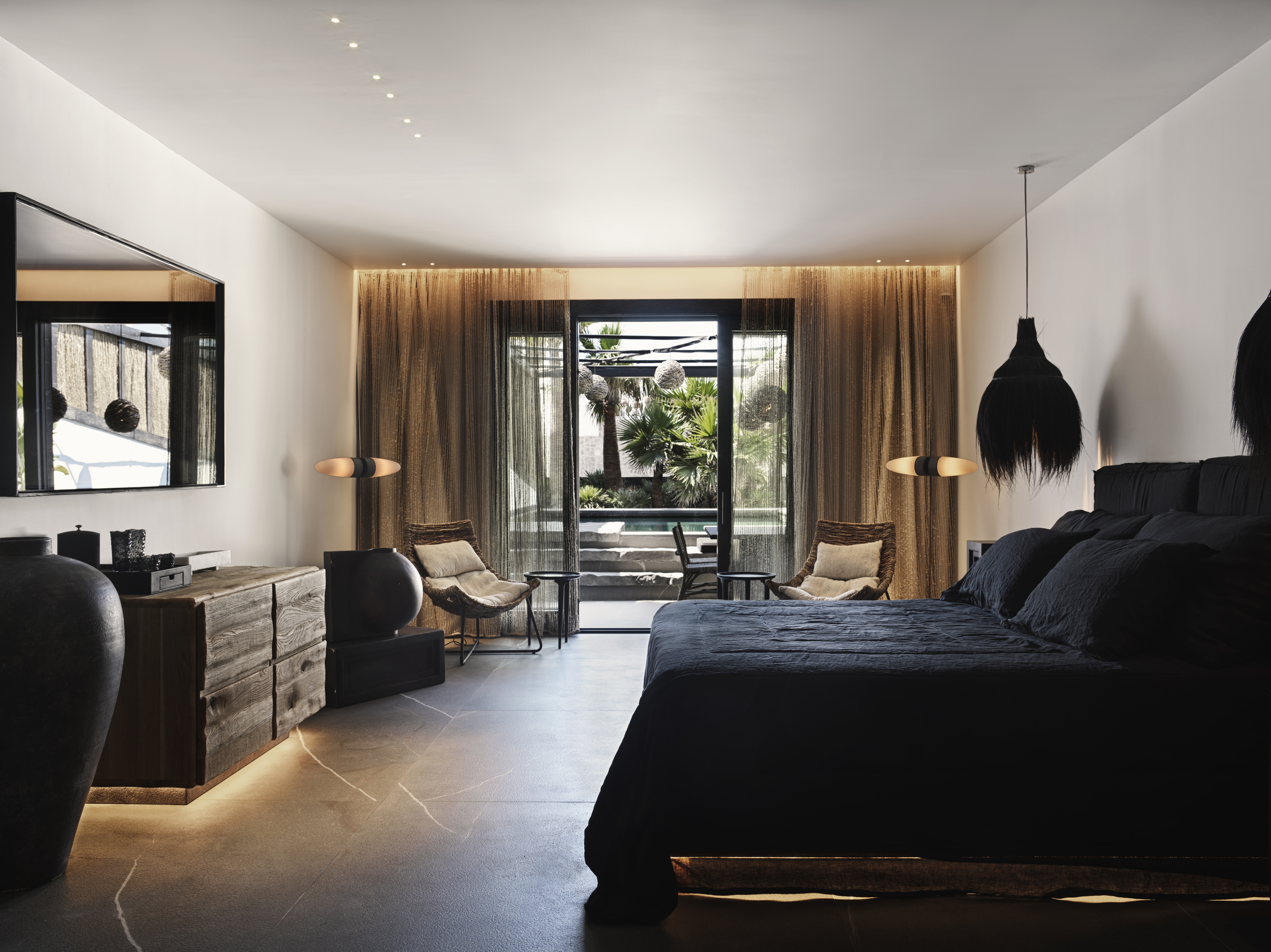 EOS suite with black interiors and private pool at Myconian O