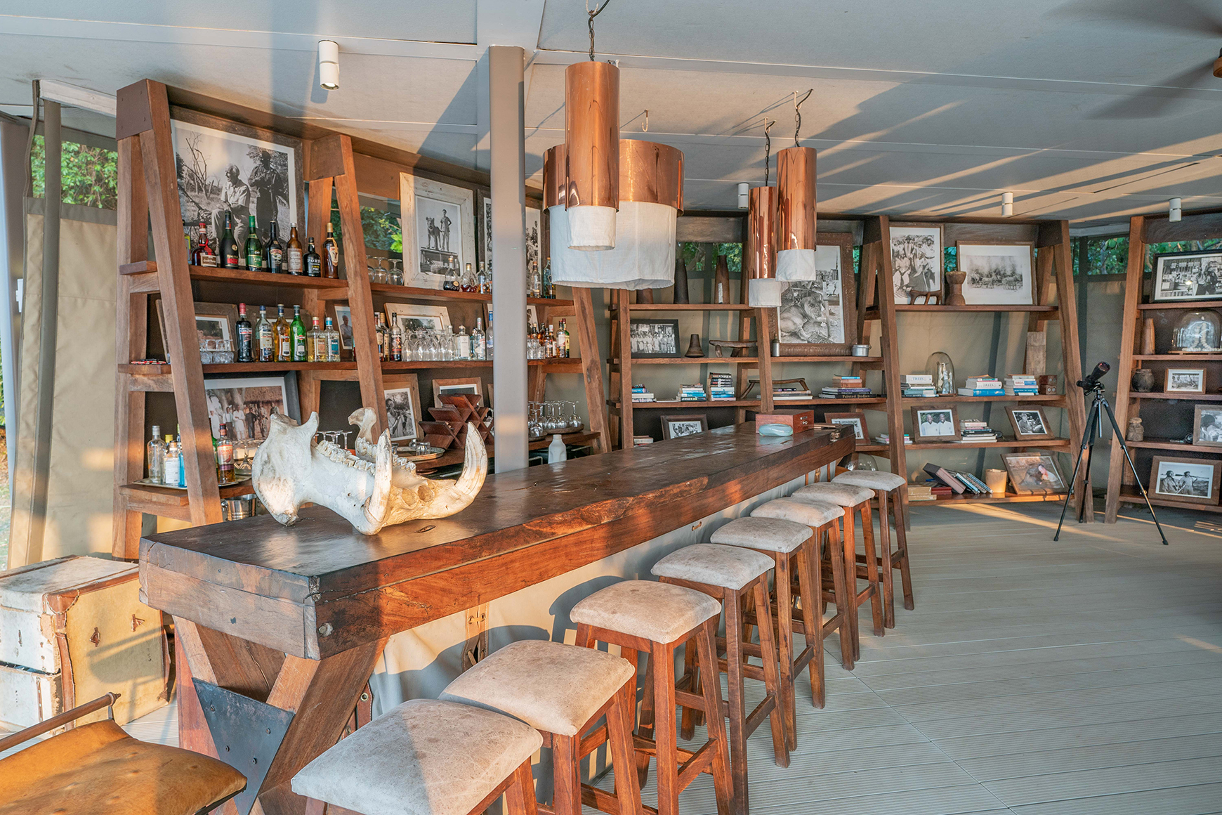 Africa, Zambia, Time + Tide Chinzombo, main area bar seating 