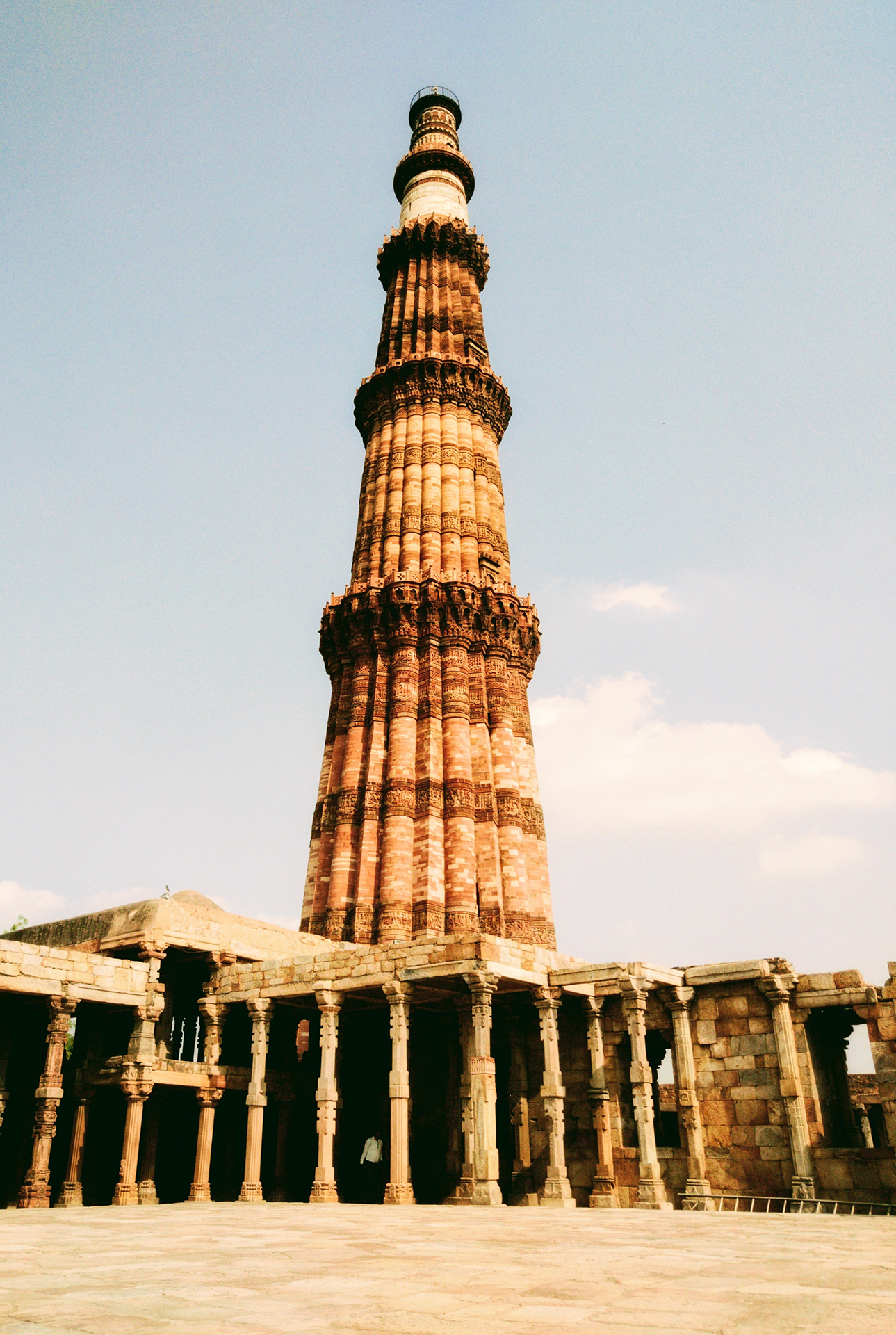 Tall brown brick monument of Qutub Minar