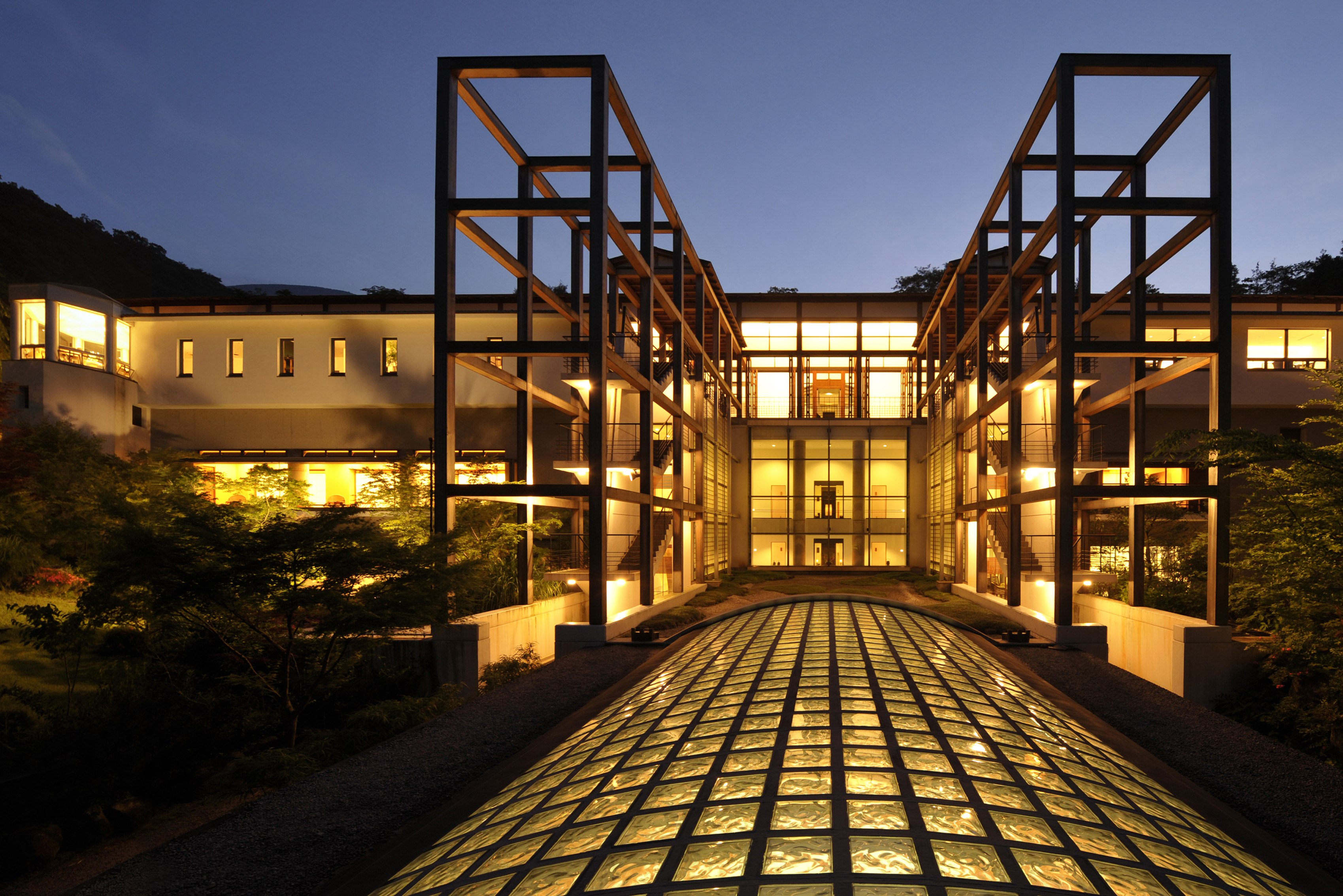 The exterior of Gora Kadan lit up at night