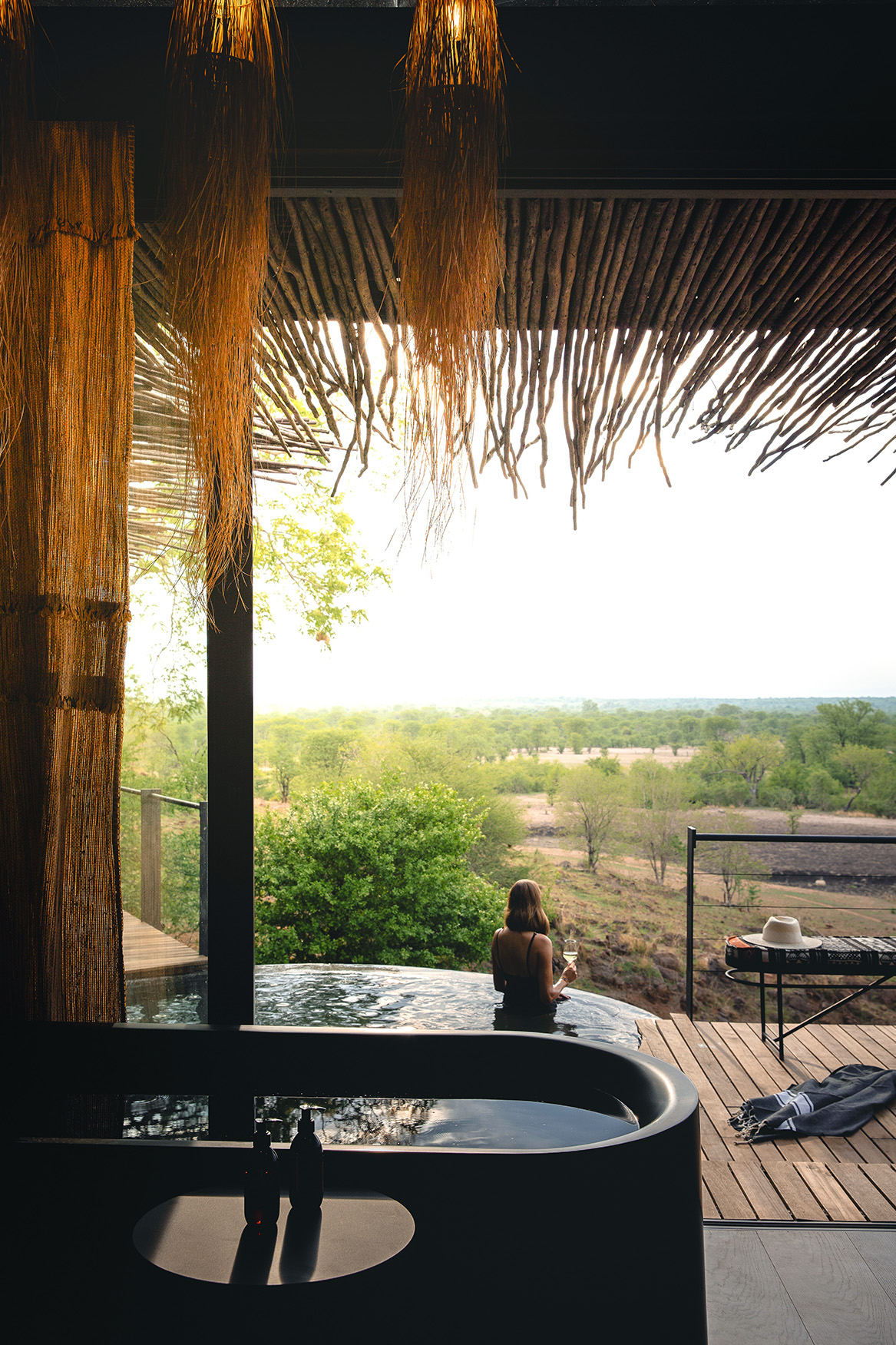 Africa, Zambia, Chichele Presidential, bath and pool in vista suite